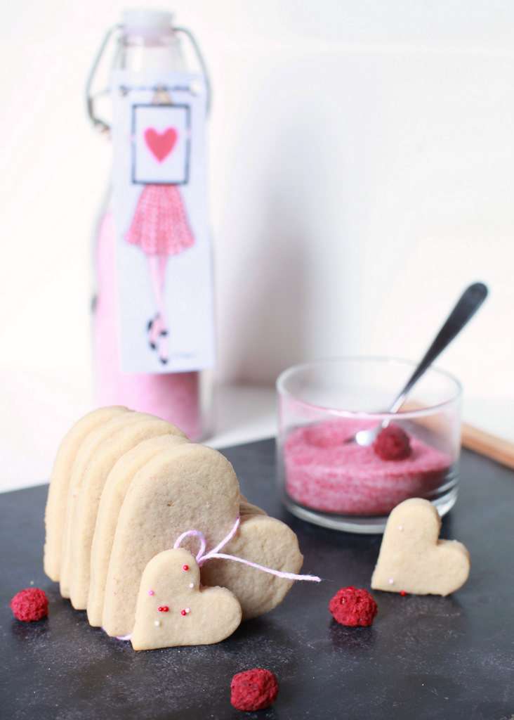 A recipe for berry infused sugar cookies made with vegan butter.