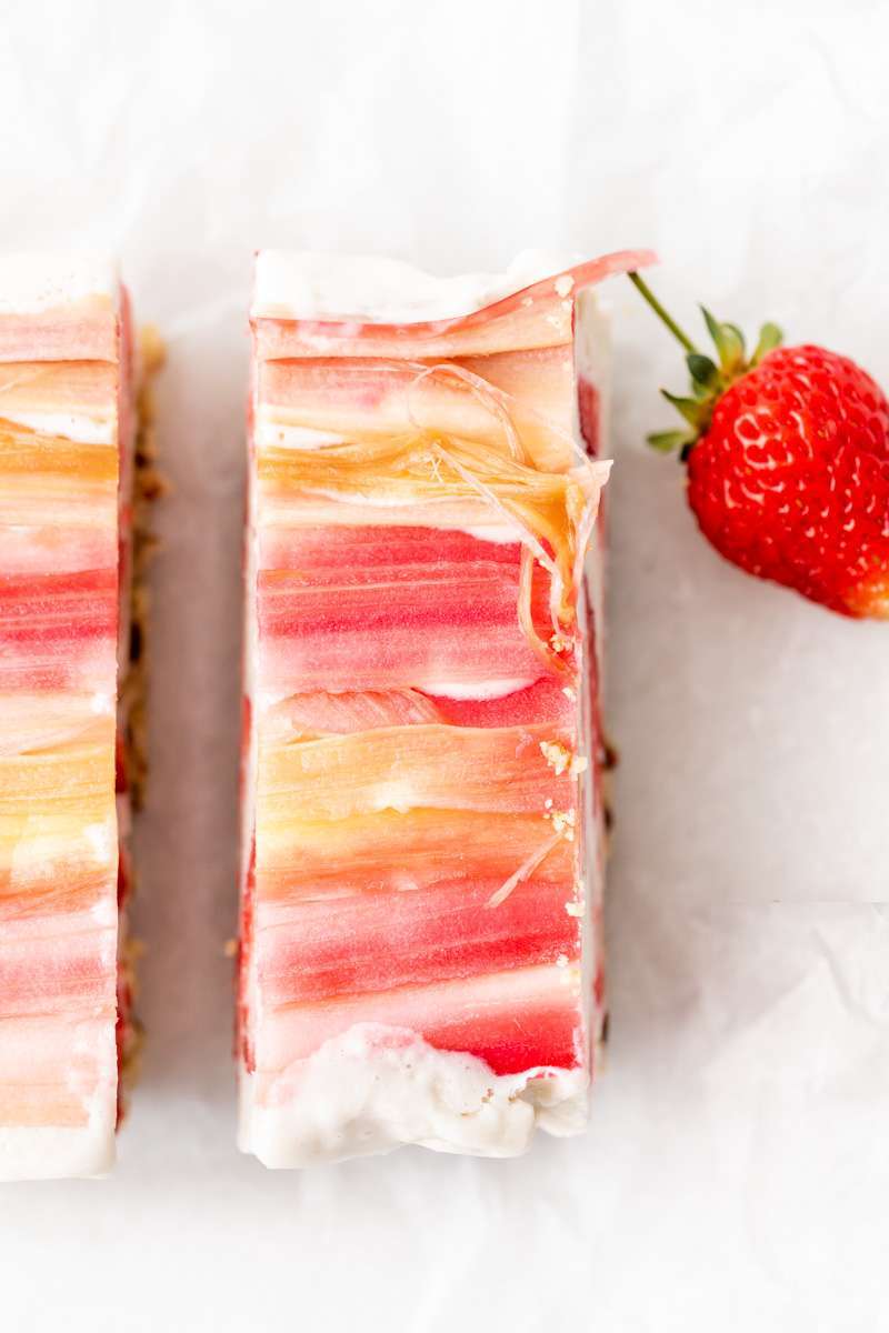 Vegan strawberry ice cream bars topped with tart candied rhubarb - an easy, no bake and gluten free recipe