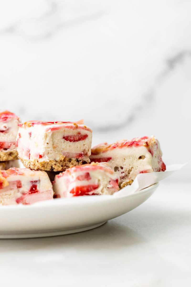 Vegan strawberry ice cream bars topped with tart candied rhubarb - an easy, no bake and gluten free recipe