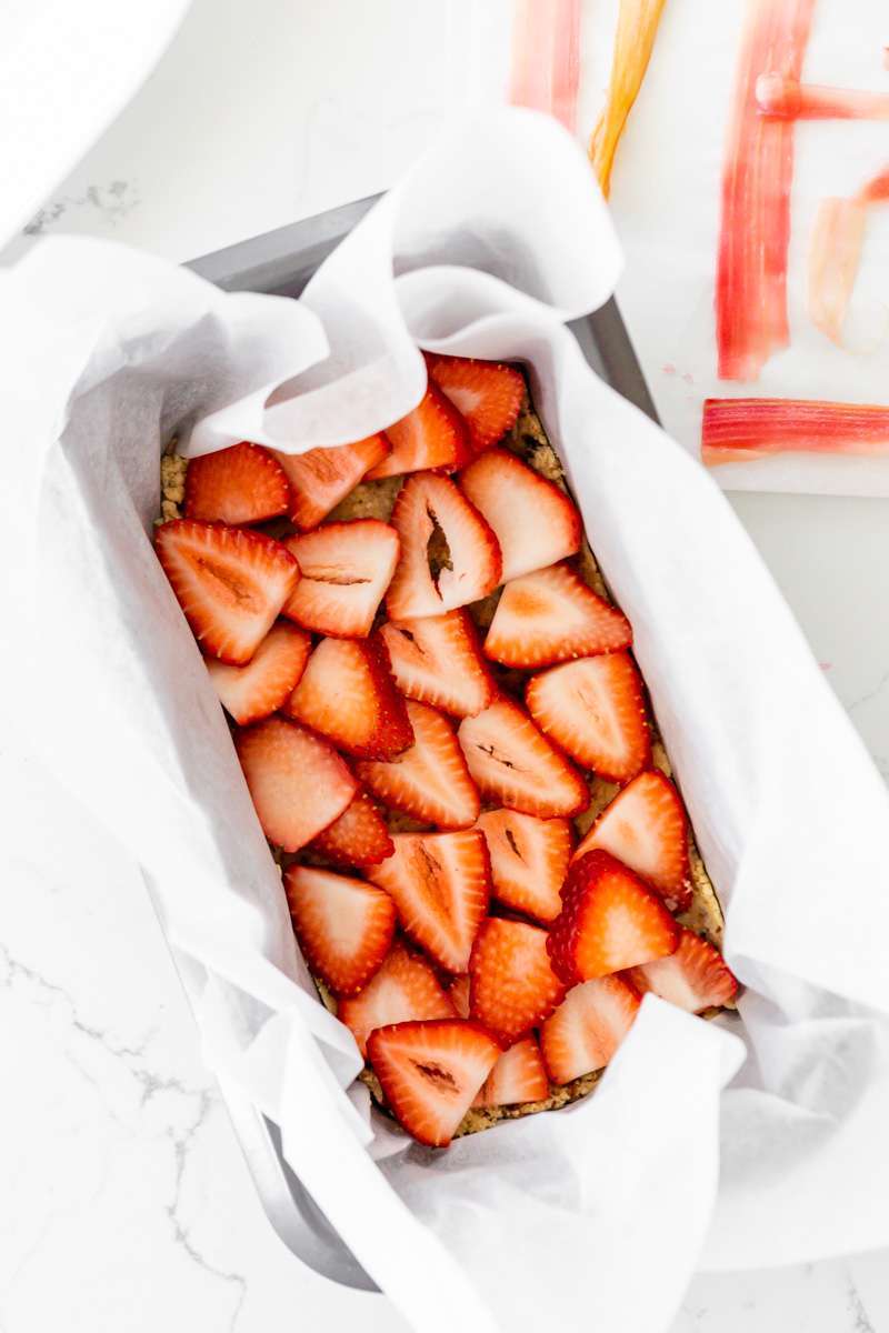 Vegan strawberry ice cream bars topped with tart candied rhubarb - an easy, no bake and gluten free recipe