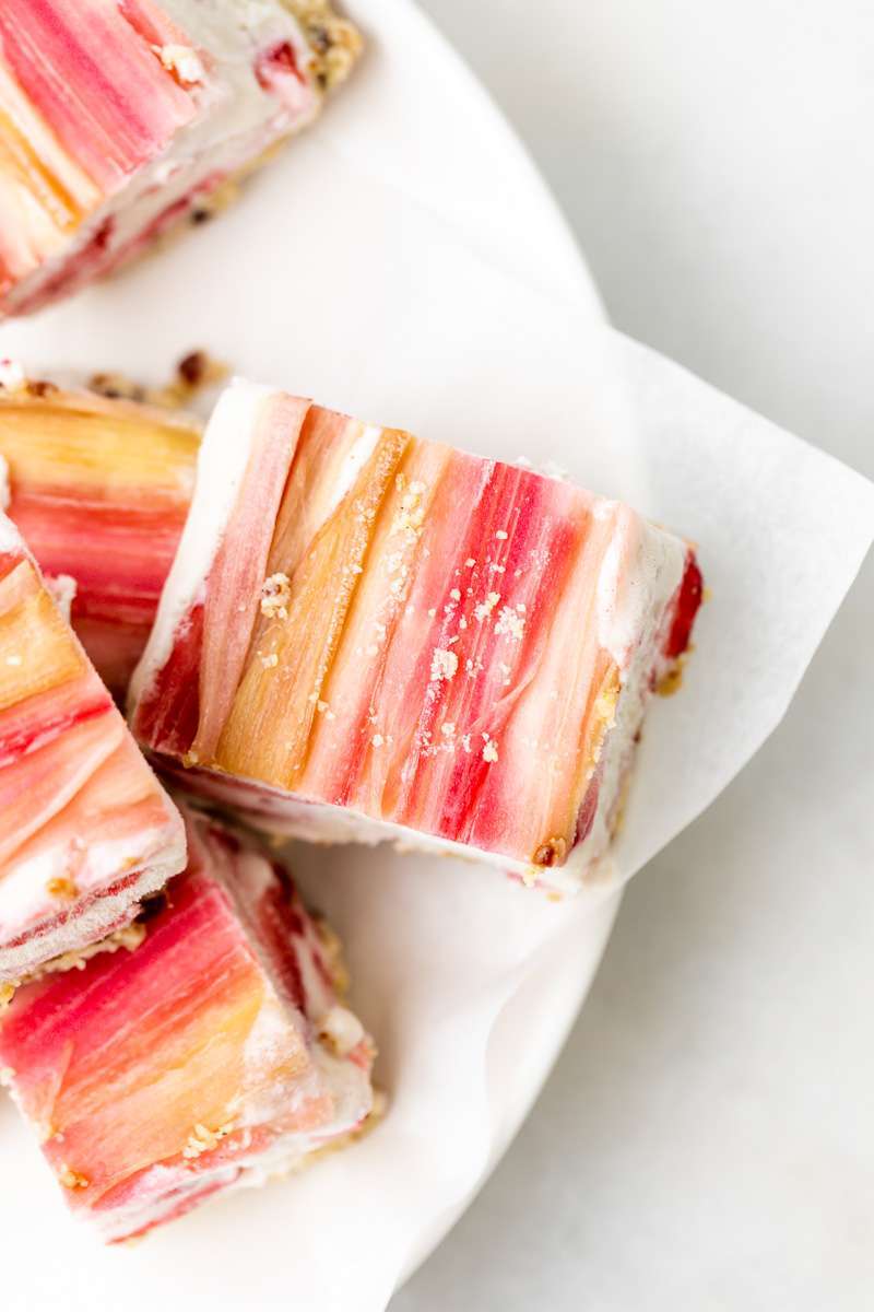 Vegan strawberry ice cream bars topped with tart candied rhubarb - an easy, no bake and gluten free recipe