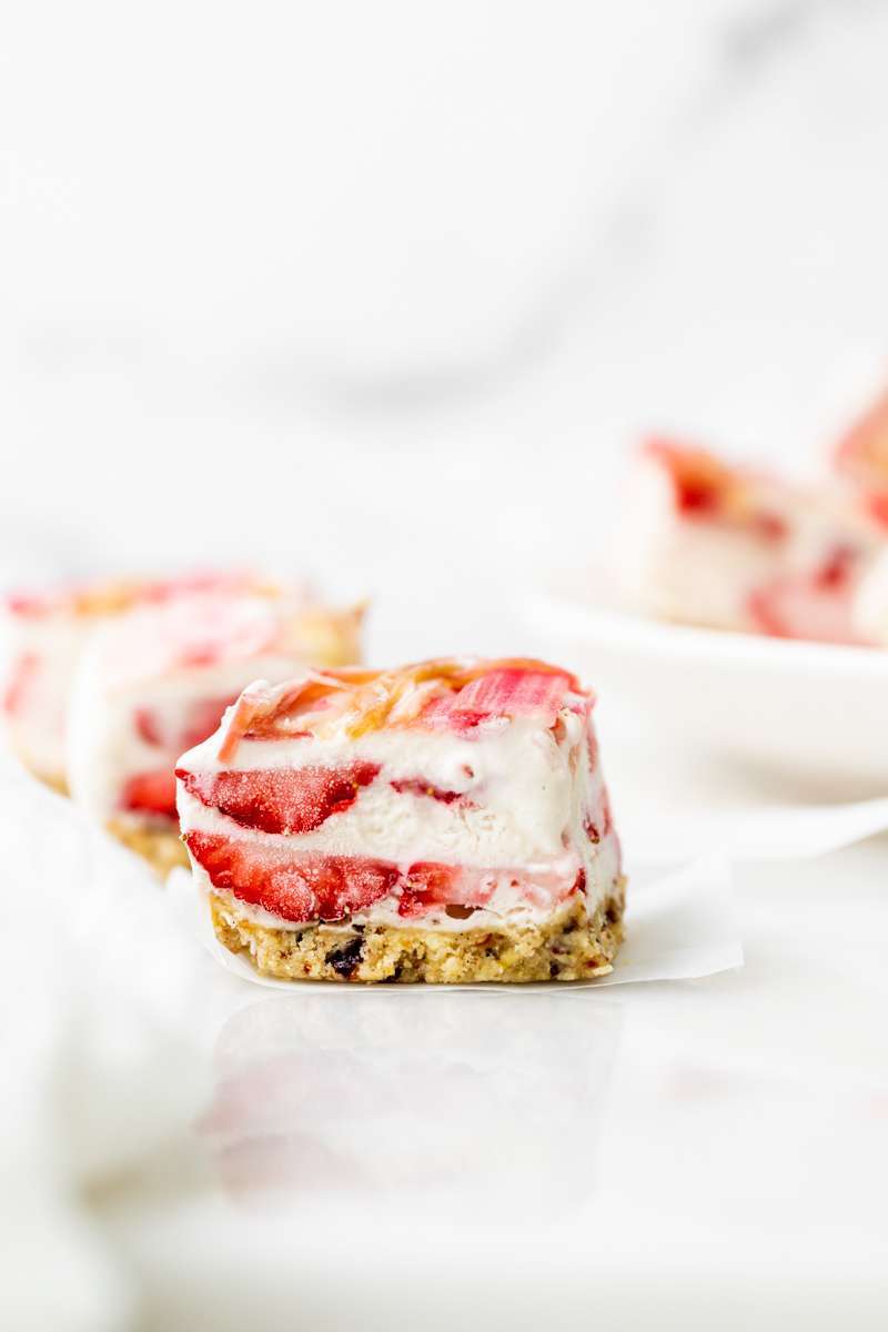 Vegan strawberry ice cream bars topped with tart candied rhubarb - an easy, no bake and gluten free recipe