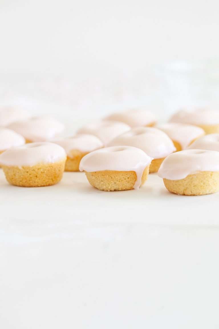 Baked donuts dipped in rosé wine glaze. Simple and sweet to make and dairy free! | Posh Little Designs