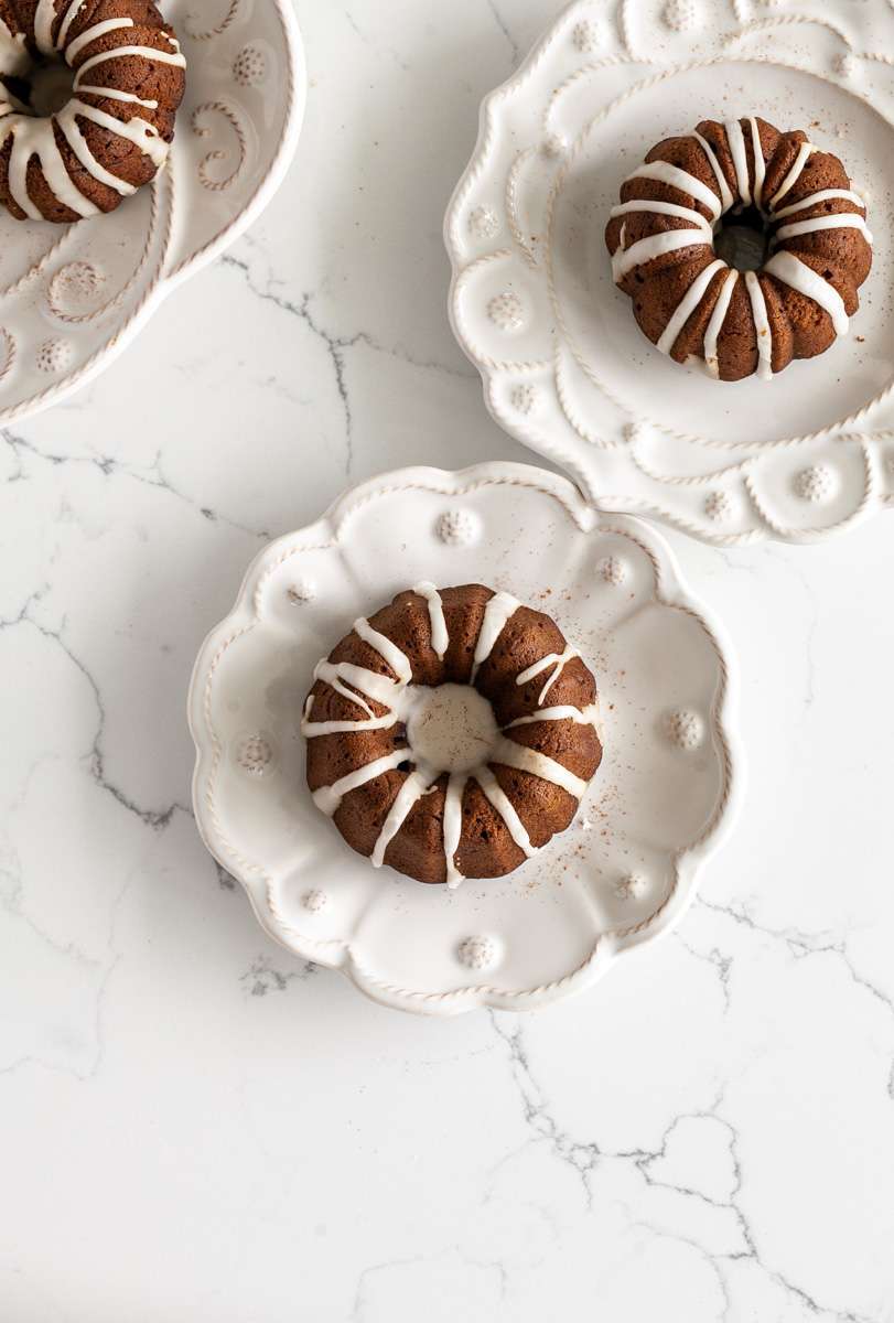 An easy recipe for Gingerbread Bundt Cakes with vanilla glaze for the holiday season