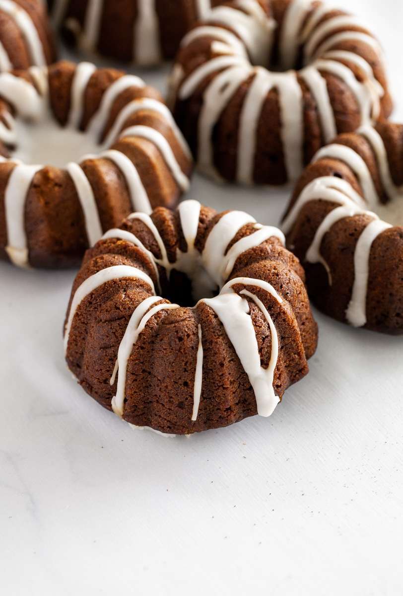 An easy recipe for Gingerbread Bundt Cakes with vanilla glaze for the holiday season