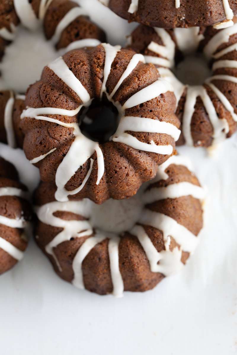 An easy recipe for Gingerbread Bundt Cakes with vanilla glaze for the holiday season 