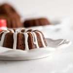 An easy recipe for Spiced Gingerbread Bundt Cakes with vanilla glaze for the holiday season