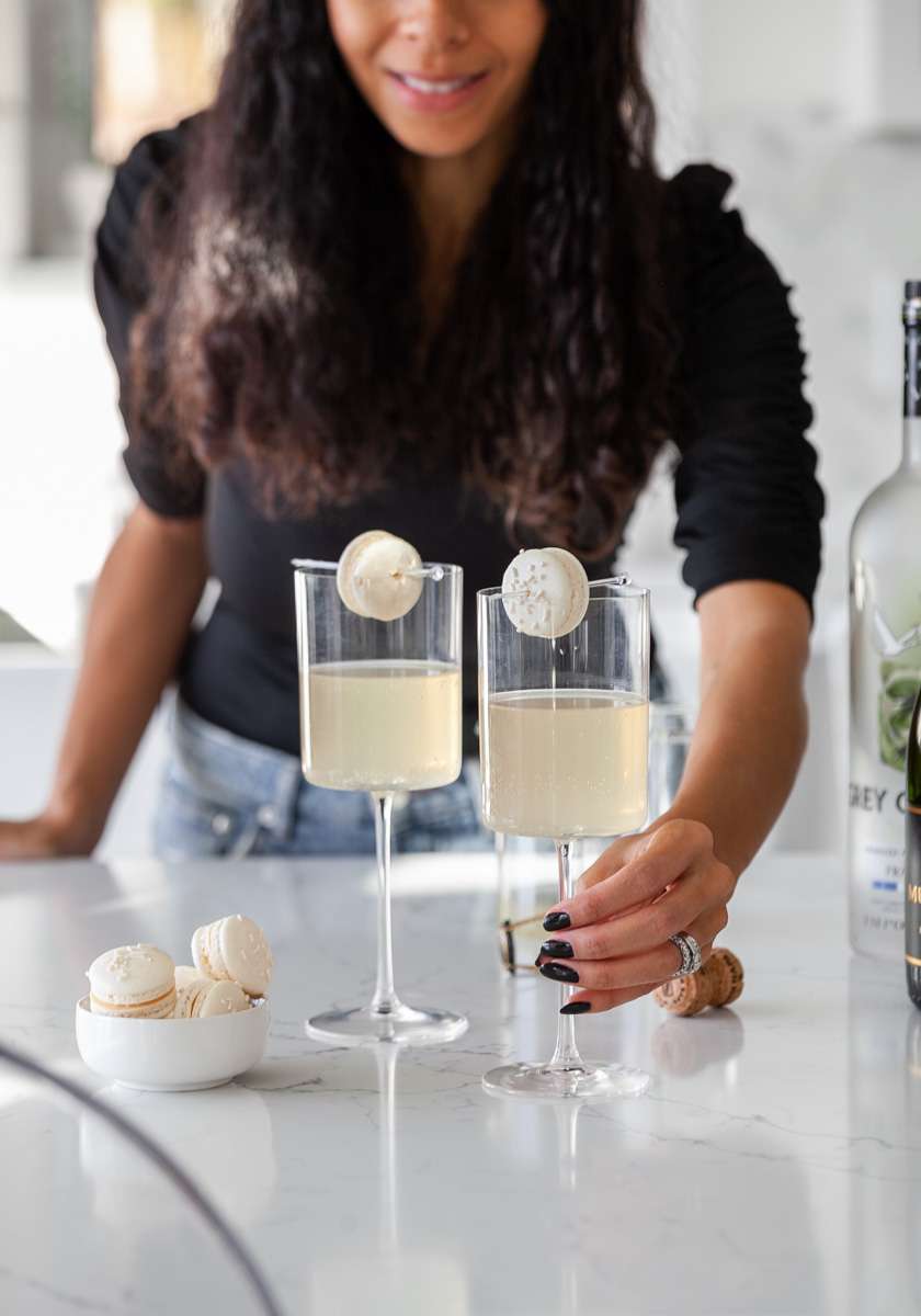 Sparkling Vanilla Macaron Cocktail recipe, made with just a few simple ingredients and a french macaron garnish.