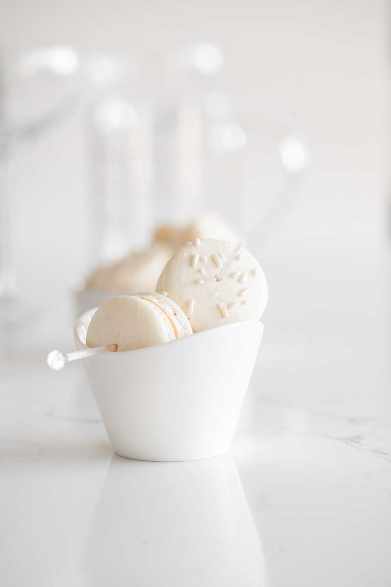 Sparkling Vanilla Macaron Cocktail recipe, made with just a few simple ingredients and a french macaron garnish.