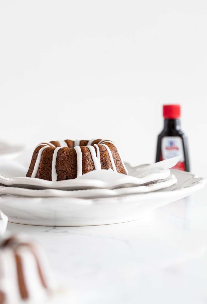 An easy recipe for Spiced Gingerbread Bundt Cakes with vanilla glaze for the holiday season