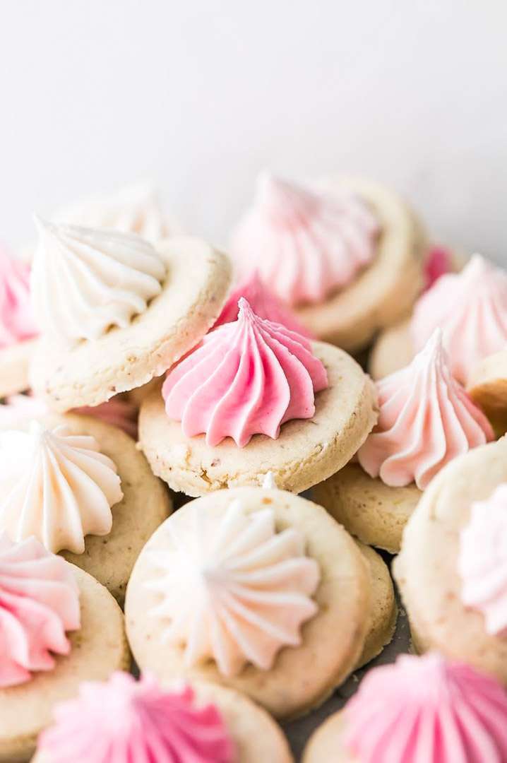 pretty pink sugar cookies recipe decorated with stiff royal icing. Dairy and gluten free.