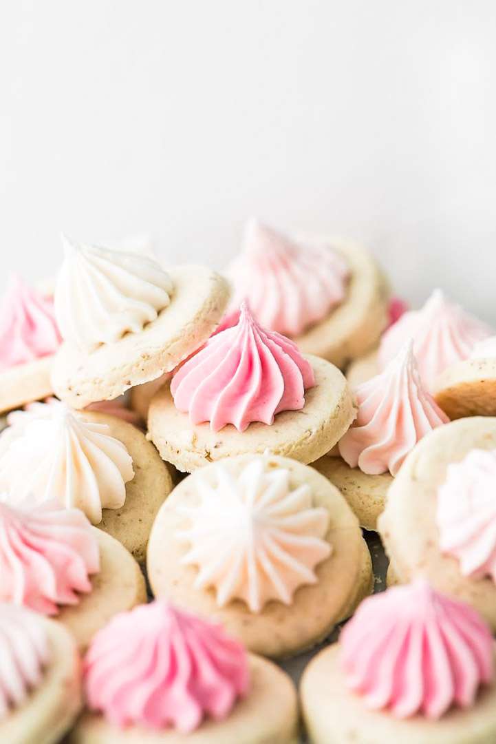 pretty pink sugar cookies recipe decorated with stiff royal icing. Dairy and gluten free.