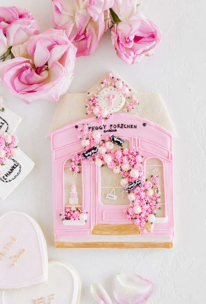 10" Peggy Porschen Sugar Cookie decorated with Royal Icing Peggy Porschen 10" sugar cookie inspired by the iconic pink bakery in London. Decorated with Royal Icing details.