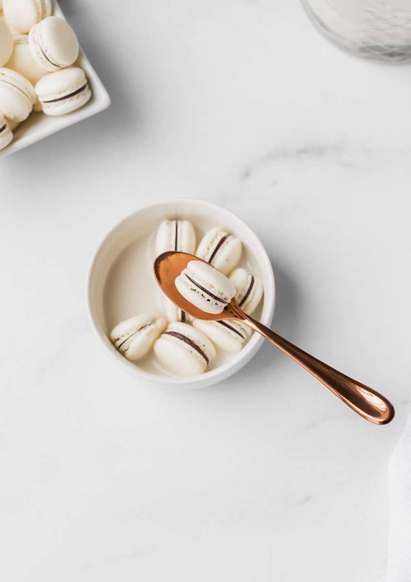 Mini French macaron breakfast cereal recipe and tik Tok trend - filled with dark chocolate ganache.