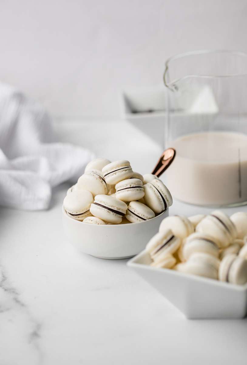 Mini French macaron breakfast cereal recipe and tik Tok trend - filled with dark chocolate ganache.