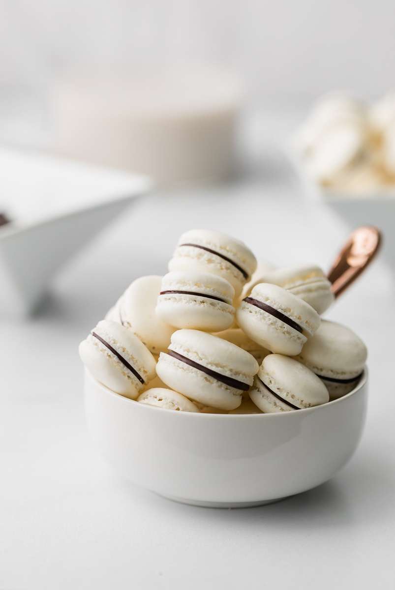 Mini French macaron breakfast cereal recipe and tik Tok trend - filled with dark chocolate ganache.