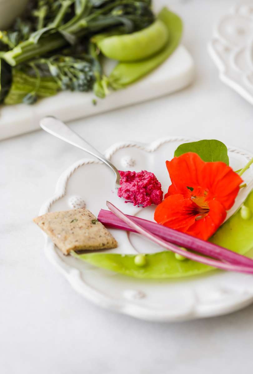 easy roasted beet hummus recipe made with garden beets and crudités - vegan & gluten free