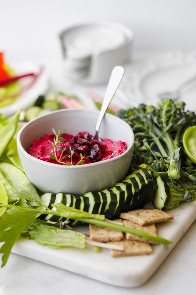 easy roasted beet hummus recipe made with garden beets and crudités - vegan & gluten free