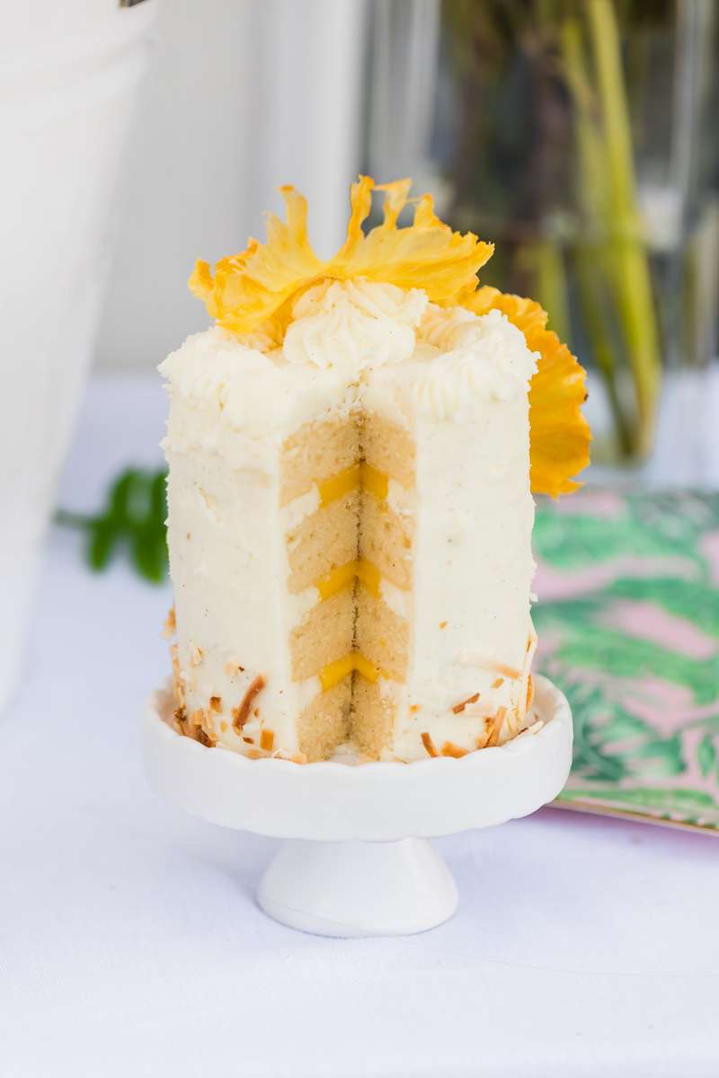 miniature birthday cake with pineapple flowers