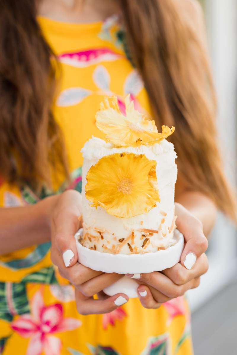 miniature birthday cake with pineapple flowers