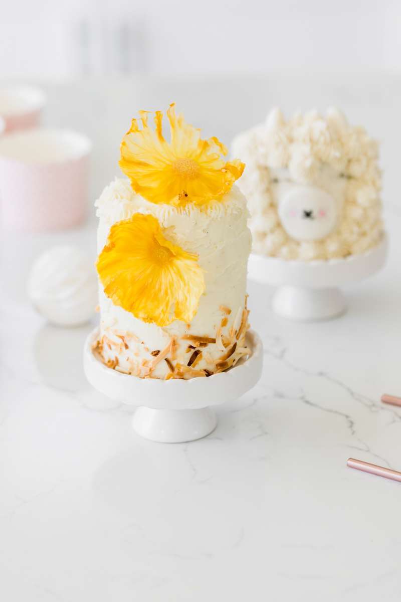 miniature birthday cakes with pineapple flowers