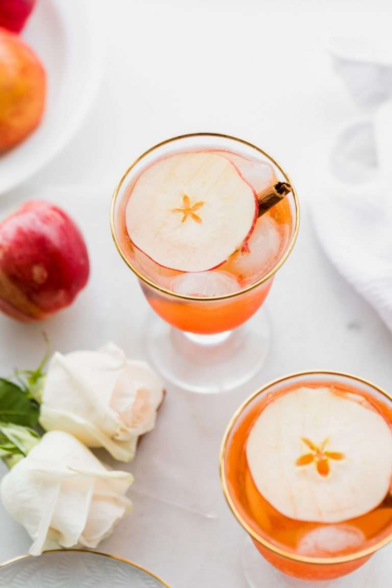 simple fall cocktail recipe for hard apple cider Aperol Spritz with apples and cinnamon