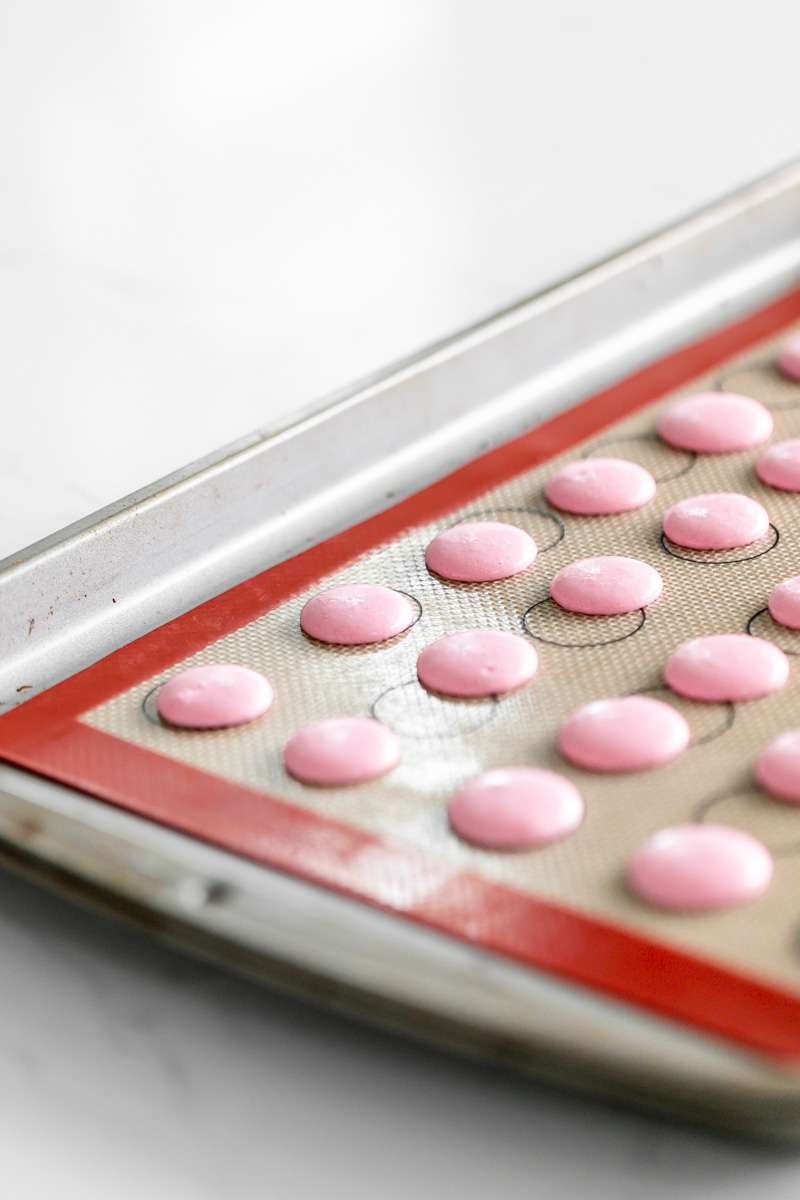 recipe for chocolate peppermint French macarons with chocolate ganache for the holiday season.