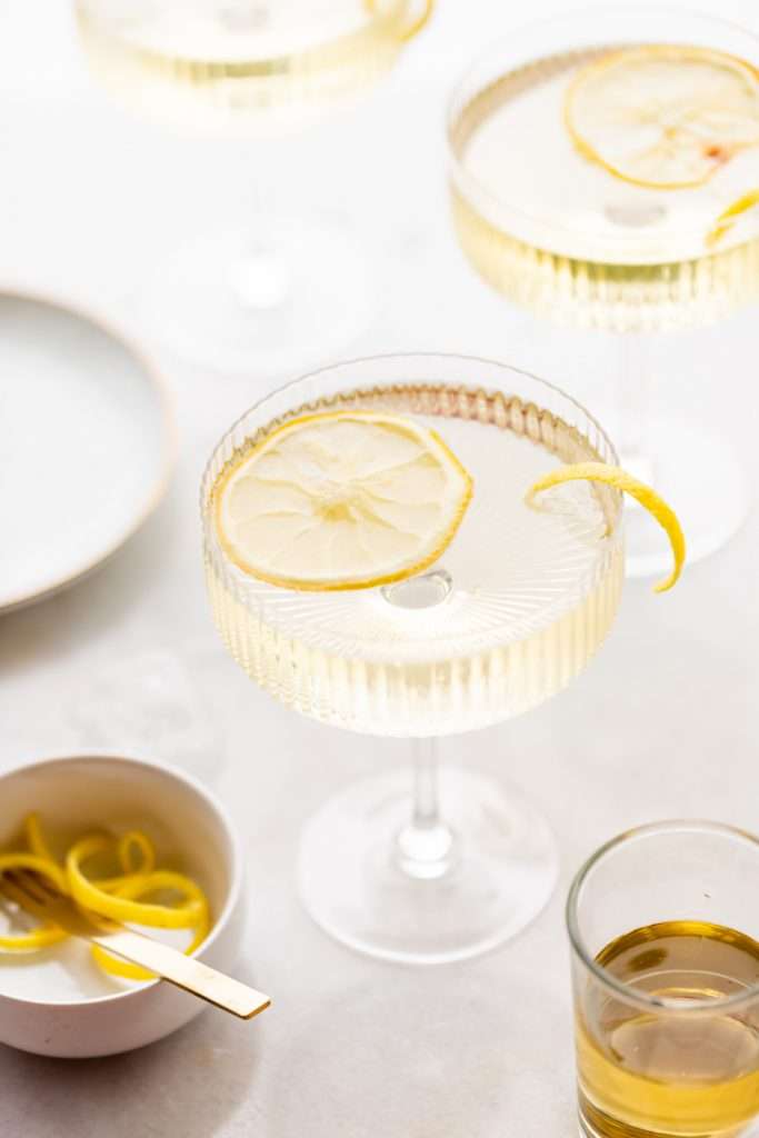 Sparkling Hummingbird cocktail made with St Germain elderflower liqueur, champagne, club soda and lemon, served over ice.