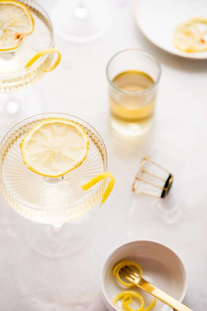 Sparkling Hummingbird cocktail made with St Germain elderflower liqueur, champagne, club soda and lemon, served over ice.