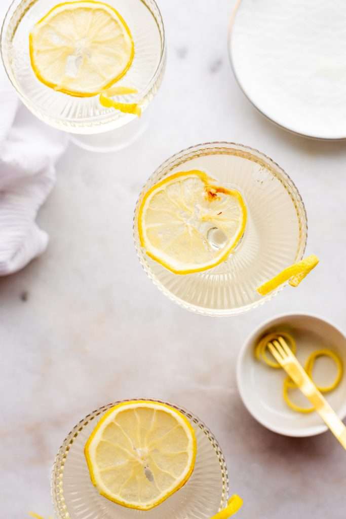 Sparkling Hummingbird cocktail made with St Germain elderflower liqueur, champagne, club soda and lemon, served over ice.