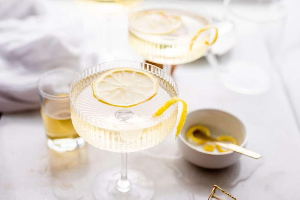 Sparkling Hummingbird cocktail made with St Germain elderflower liqueur, champagne, club soda and lemon, served over ice.