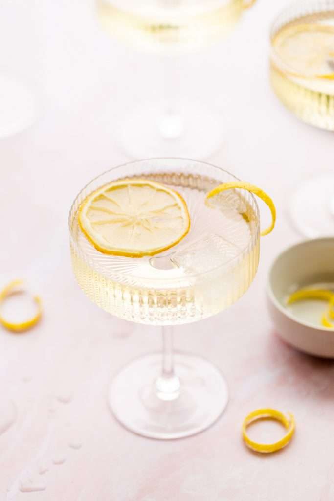 Sparkling Hummingbird cocktail made with St Germain elderflower liqueur, champagne, club soda and lemon, served over ice.