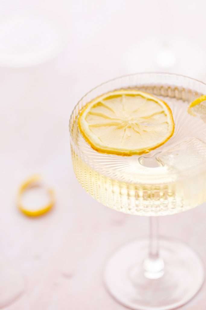 Sparkling Hummingbird cocktail made with St Germain elderflower liqueur, champagne, club soda and lemon, served over ice.
