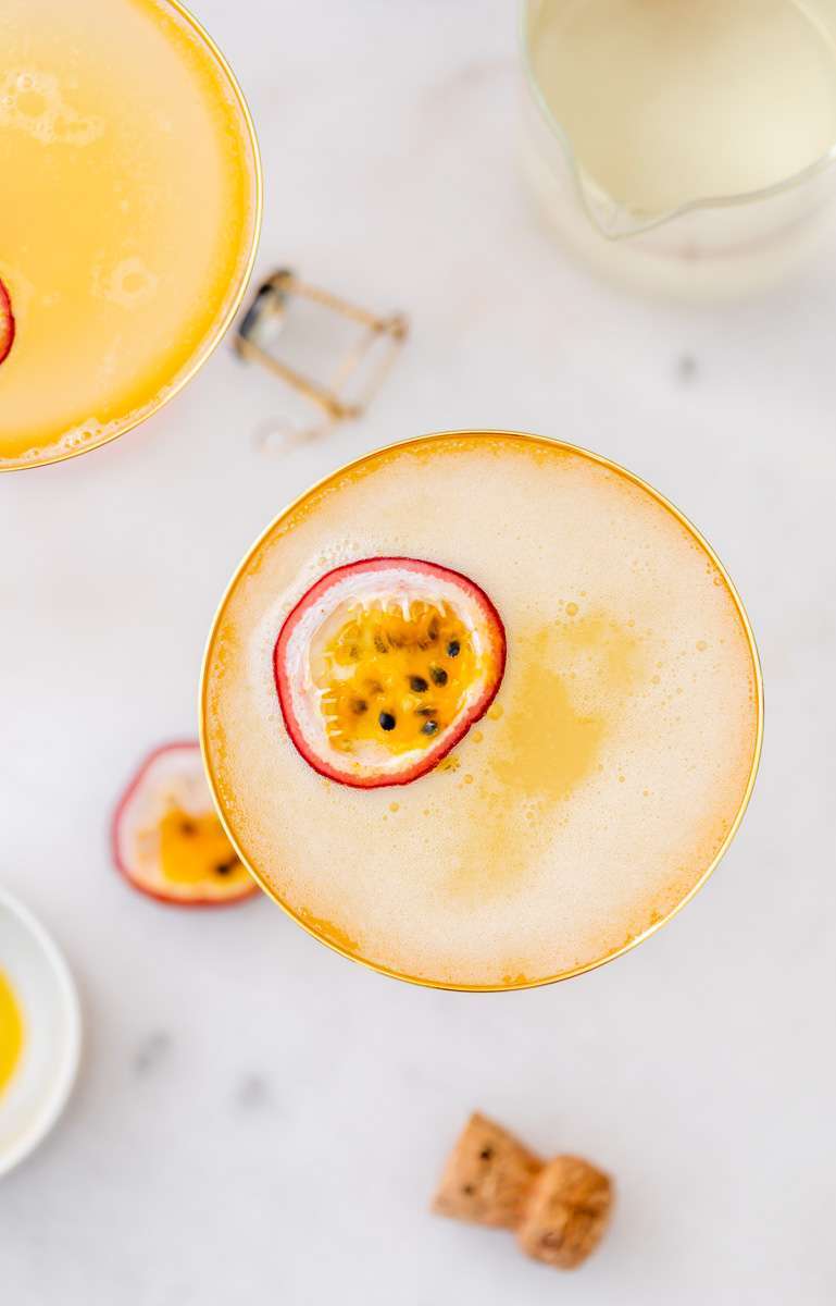 Light and refreshing passion fruit French 75 cocktails for spring and summer. Just for ingredients! Recipe and quick video included!