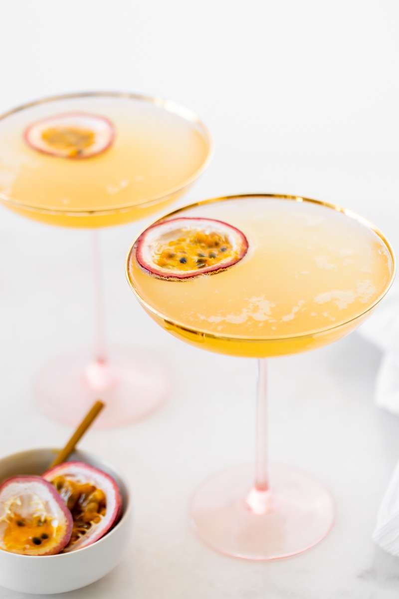 Light and refreshing passion fruit French 75 cocktails for spring and summer. Just for ingredients! Recipe and quick video included!