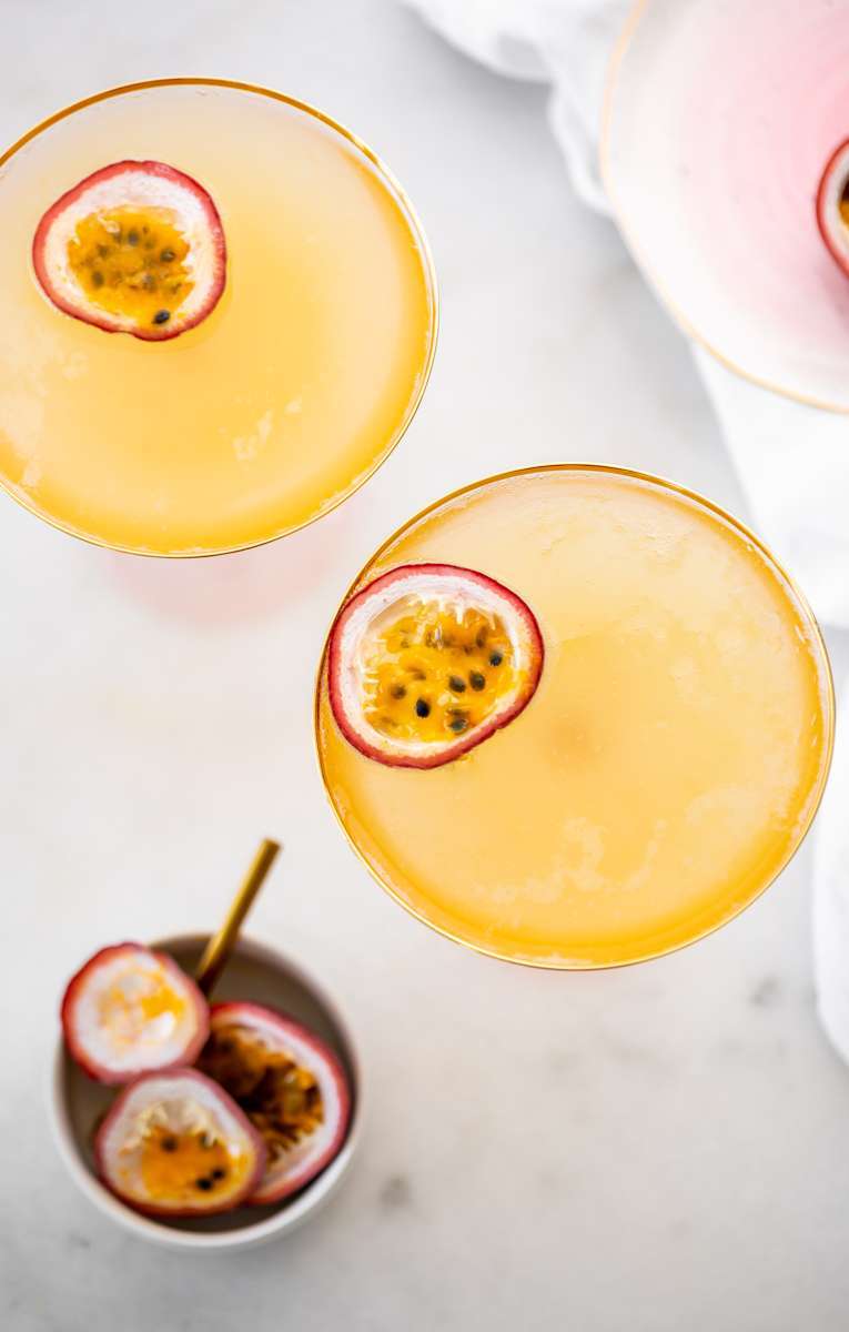 Light and refreshing passion fruit French 75 cocktails for spring and summer. Just for ingredients! Recipe and quick video included!