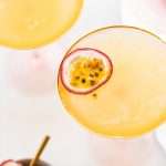 Light and refreshing passion fruit French 75 cocktails for spring and summer. Just for ingredients! Recipe and quick video included!