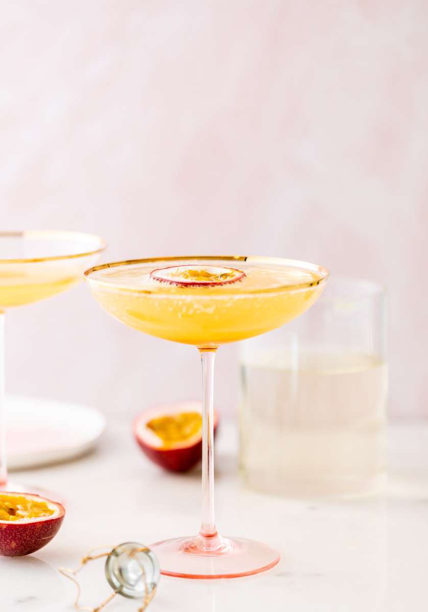 Light and refreshing passion fruit French 75 cocktails for spring and summer. Just for ingredients! Recipe and quick video included!