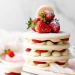 Recipe and instructions for this Fresh and delicious Strawberry Shortcake Macaron cake complete with garden strawberries, and vanilla filing. Dairy and gluten free summer recipe