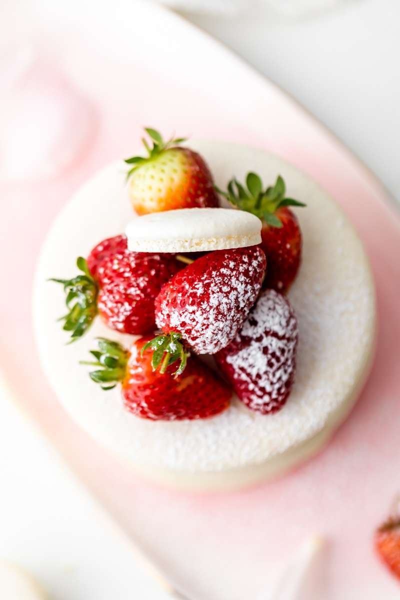 Recipe and instructions for this Fresh and delicious Strawberry Shortcake Macaron cake complete with garden strawberries, and vanilla filing. Dairy and gluten free summer recipe
