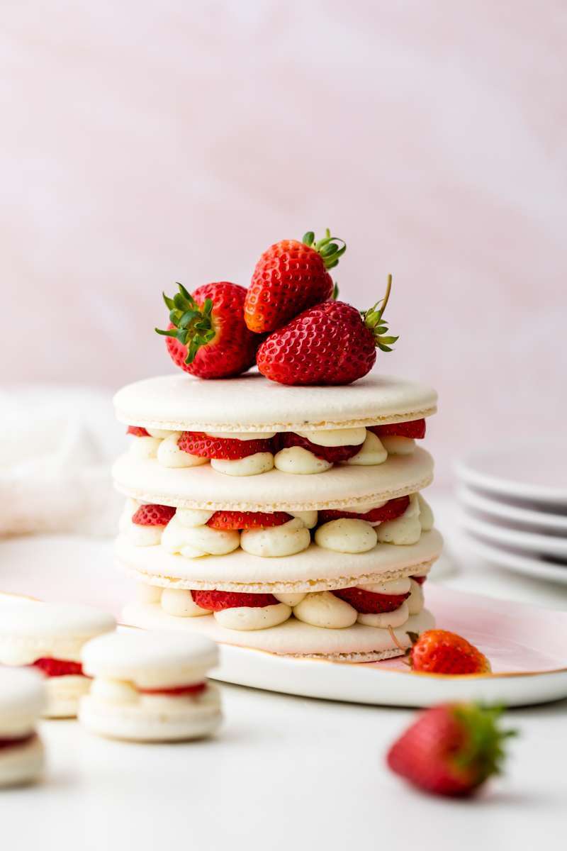 Recipe and instructions for this Fresh and delicious Strawberry Shortcake Macaron cake complete with garden strawberries, and vanilla filing. Dairy and gluten free summer recipe