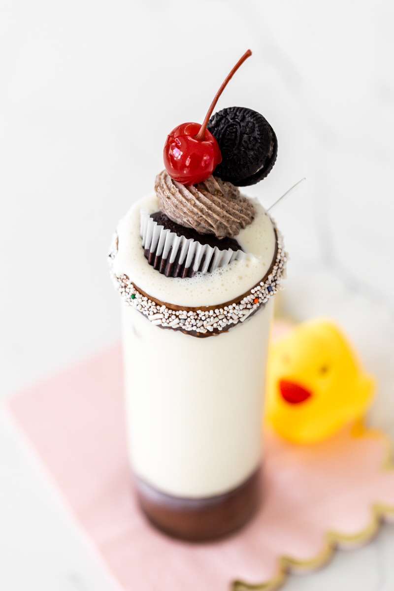 birthday milkshakes with Oreo cupcakes sprinkles and a cherry on top