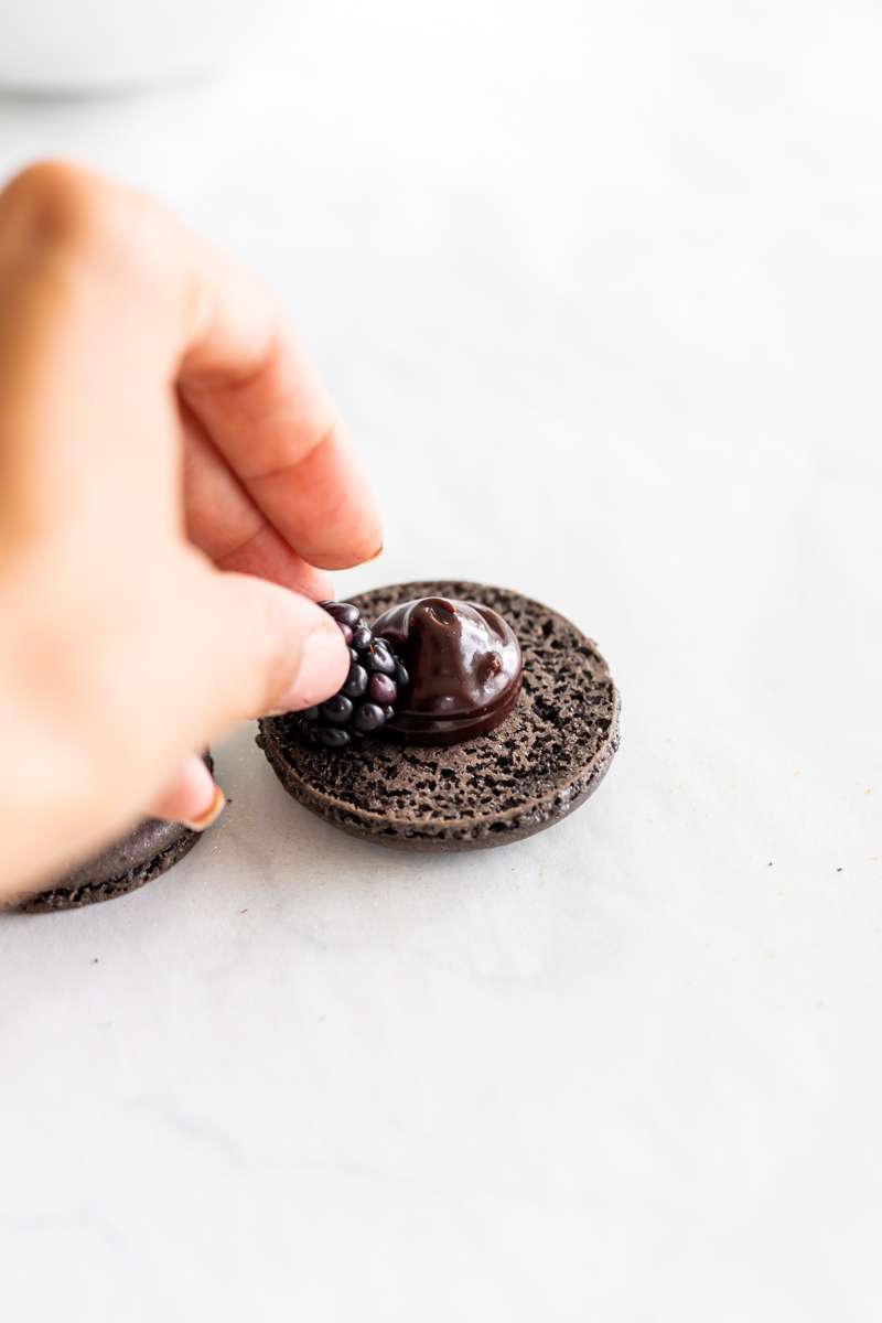 how to assemble blackberry chocolate macarons - step by step