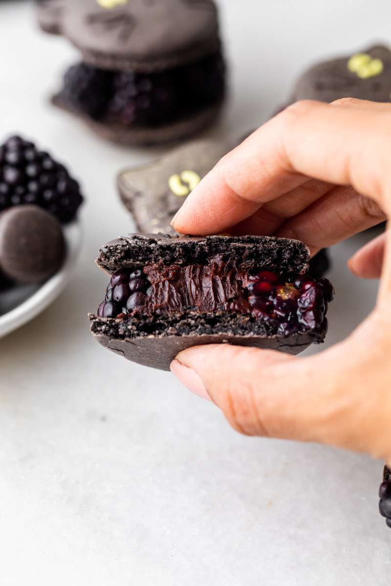 blackberry chocolate ganache macarons cut in half