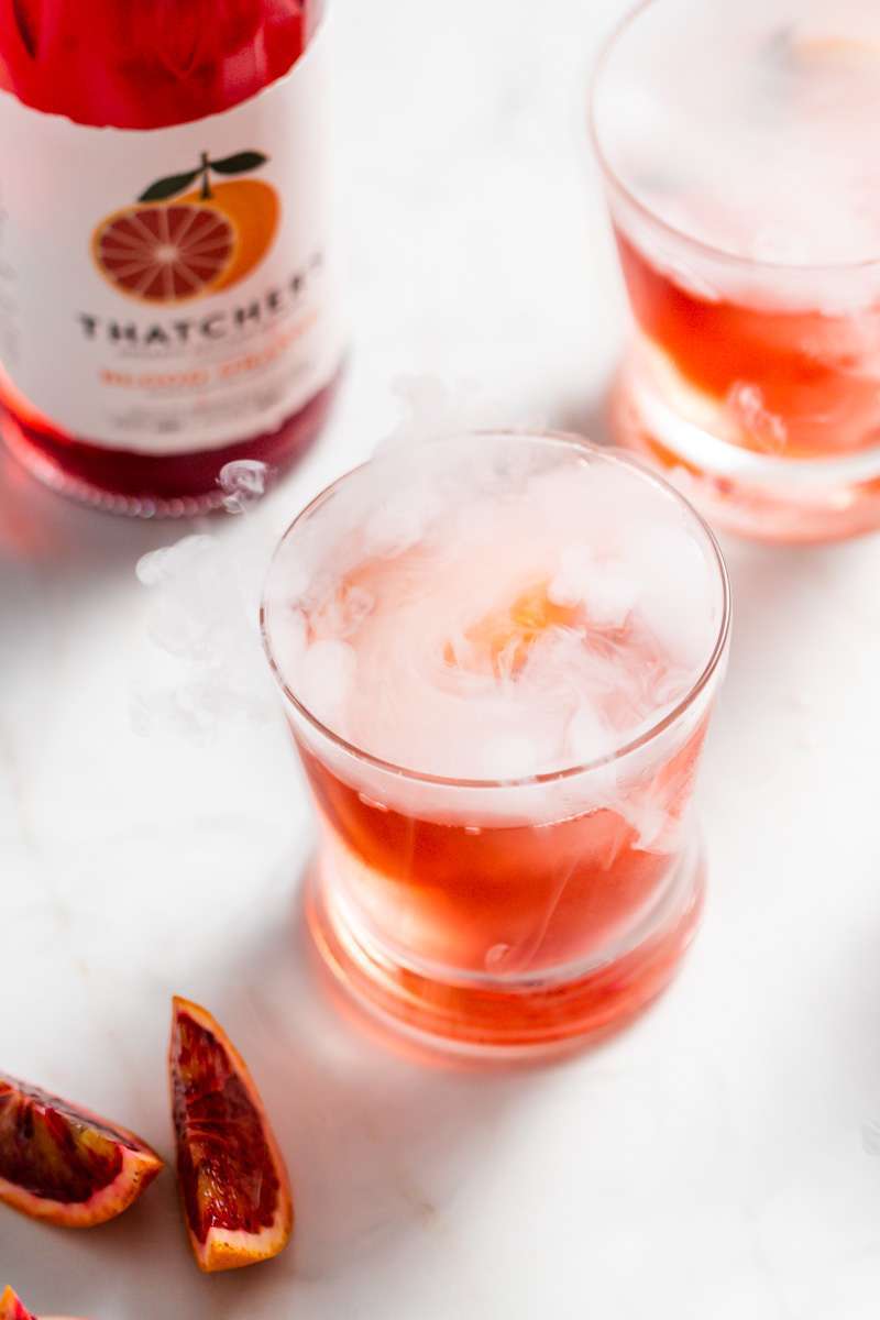 A twist on the classic Negroni infused with Blood Orange liqueur from Thatcher's Organic, and fresh blood orange, served on the rocks with dry ice for upcoming fall and halloween!