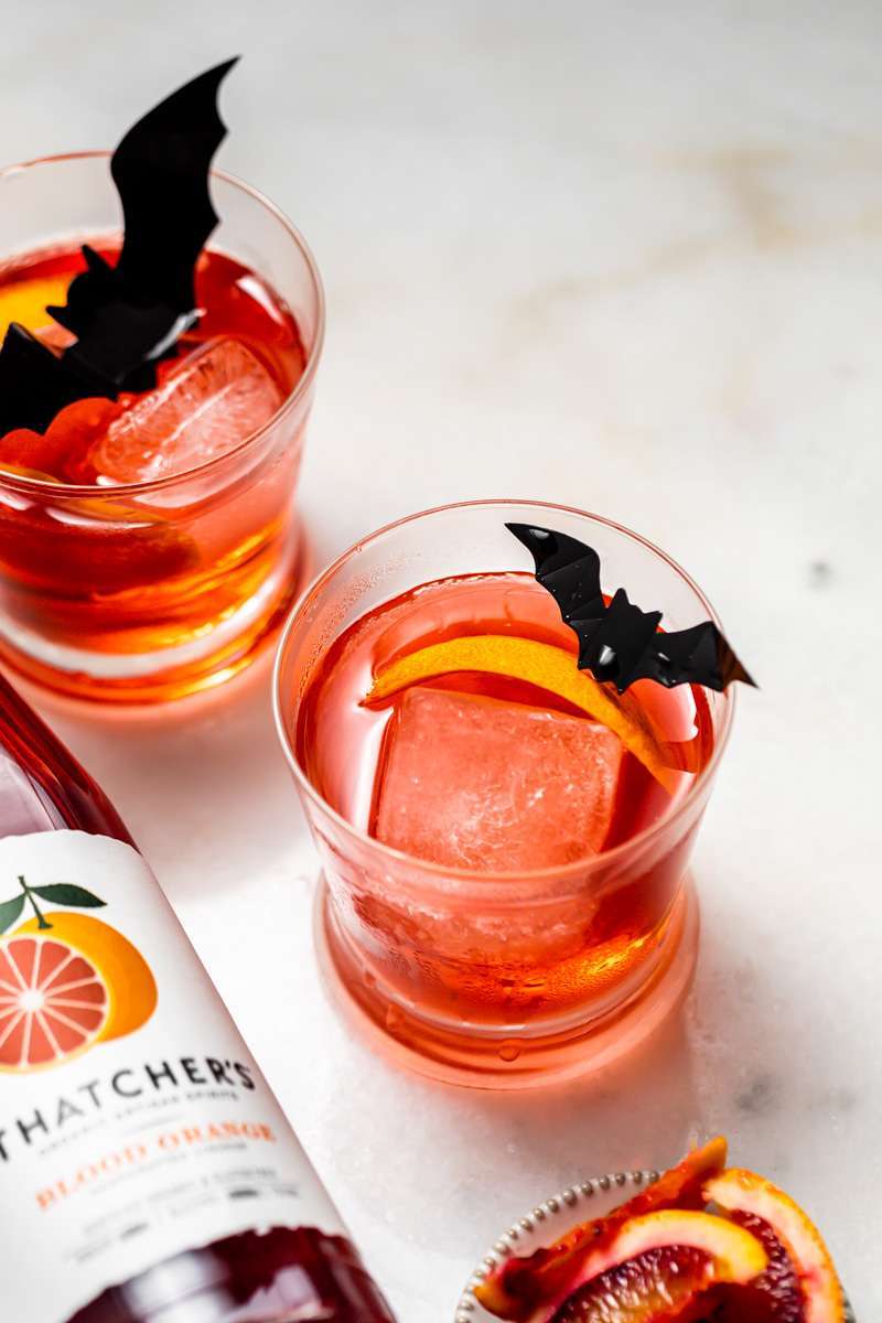 A twist on the classic Negroni infused with Blood Orange liqueur from Thatcher's Organic, and fresh blood orange, served on the rocks with dry ice for upcoming fall and halloween!