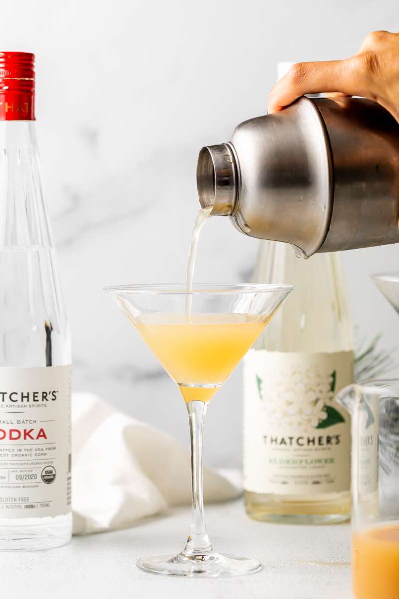 Spiced Pear Martini for the holiday season - Made with Thatcher's Organic Vodka, pear juice, elderflower and spiced simple syrup.