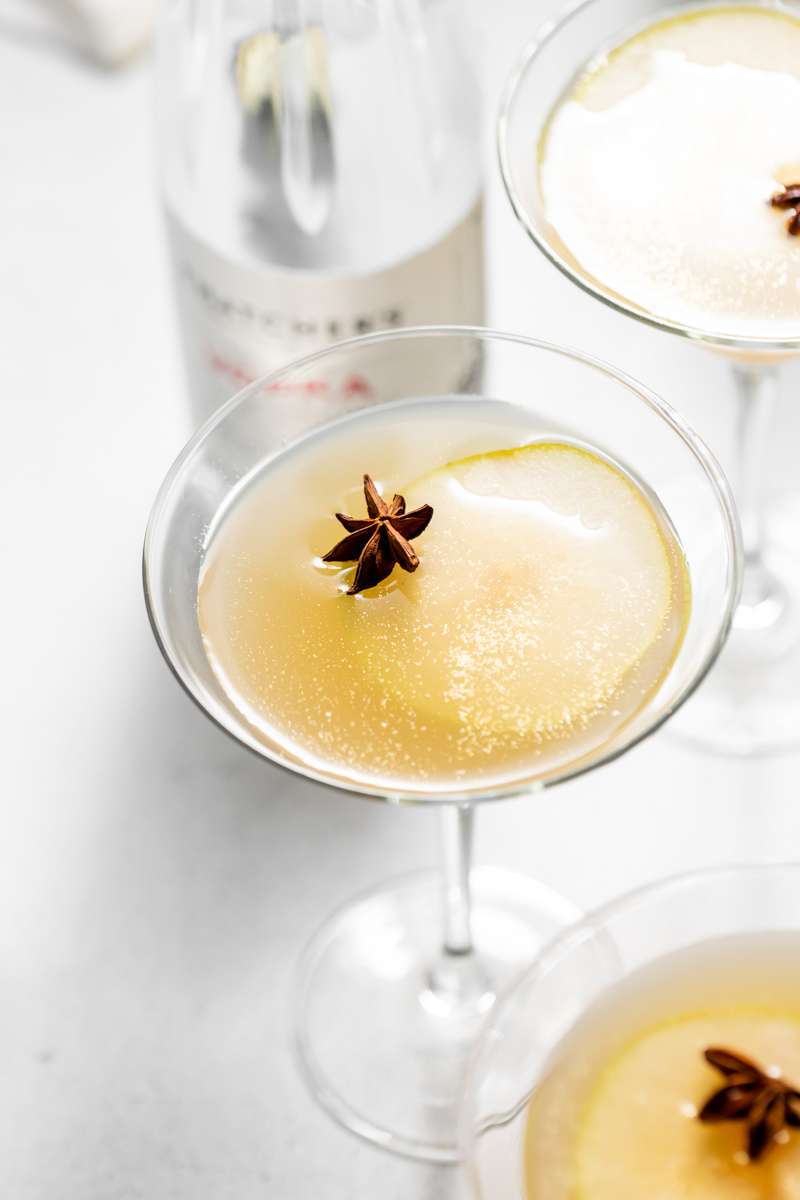 Spiced Pear Martini for the holiday season - Made with Thatcher's Organic Vodka, pear juice, elderflower and spiced simple syrup.