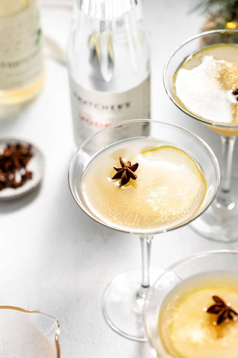 Spiced Pear Martini for the holiday season - Made with Thatcher's Organic Vodka, pear juice, elderflower and spiced simple syrup.