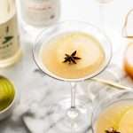 Spiced Pear Martini for the holiday season - Made with Thatcher's Organic Vodka, pear juice, elderflower and spiced simple syrup.